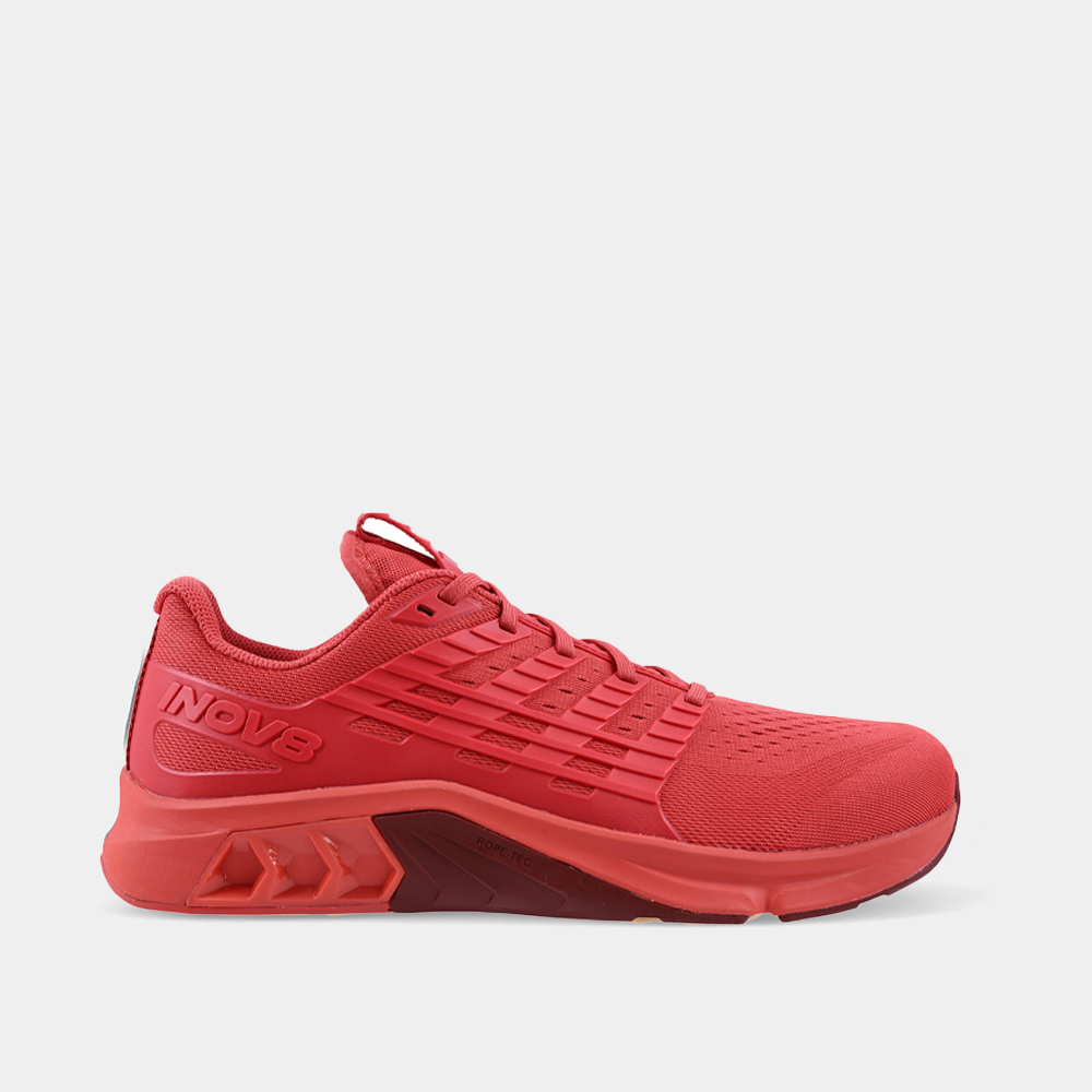 Red athletic shoe with 'NOVA' branding on a light gray background
