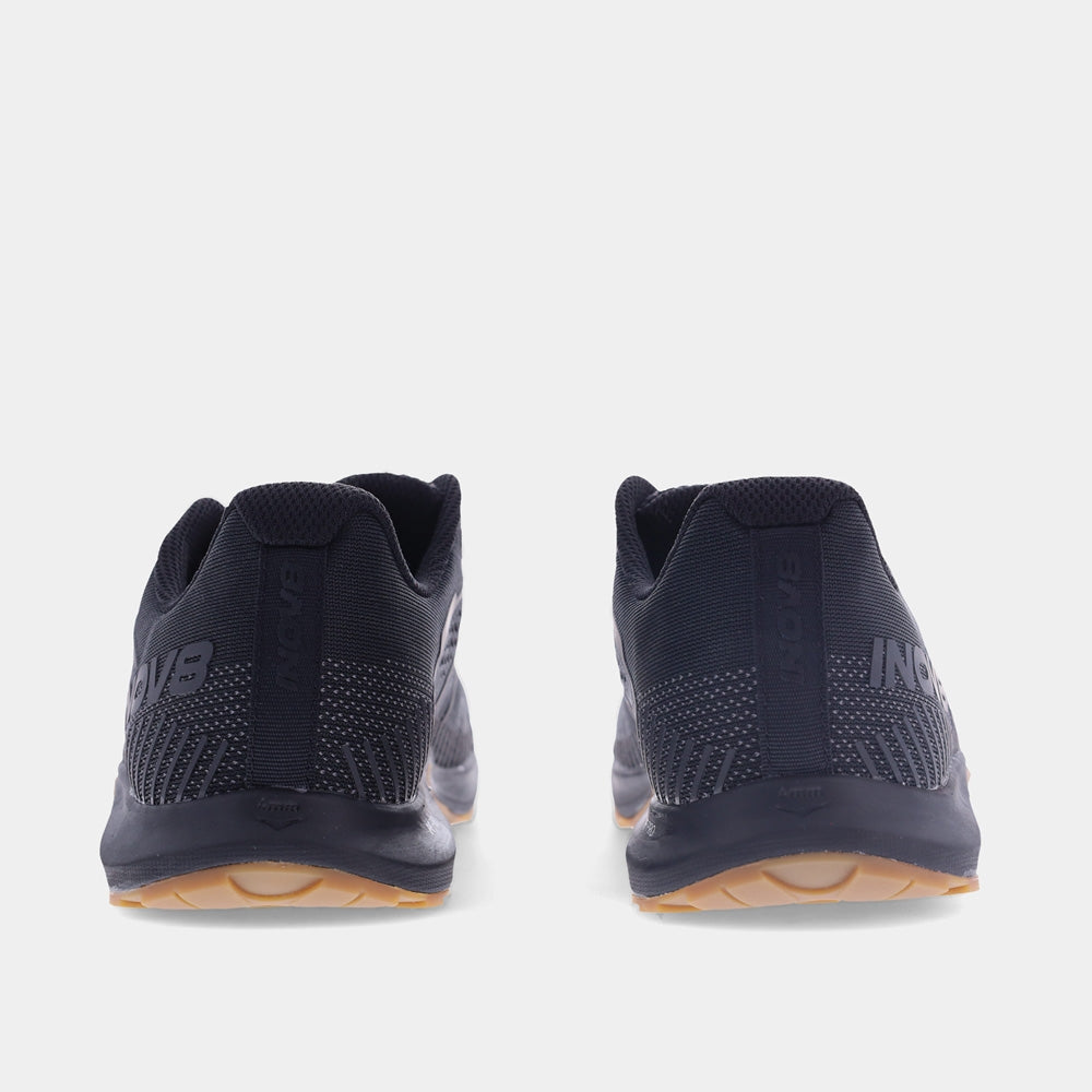 Pair of INOV8 F-Fly training shoes, black and gum, back view