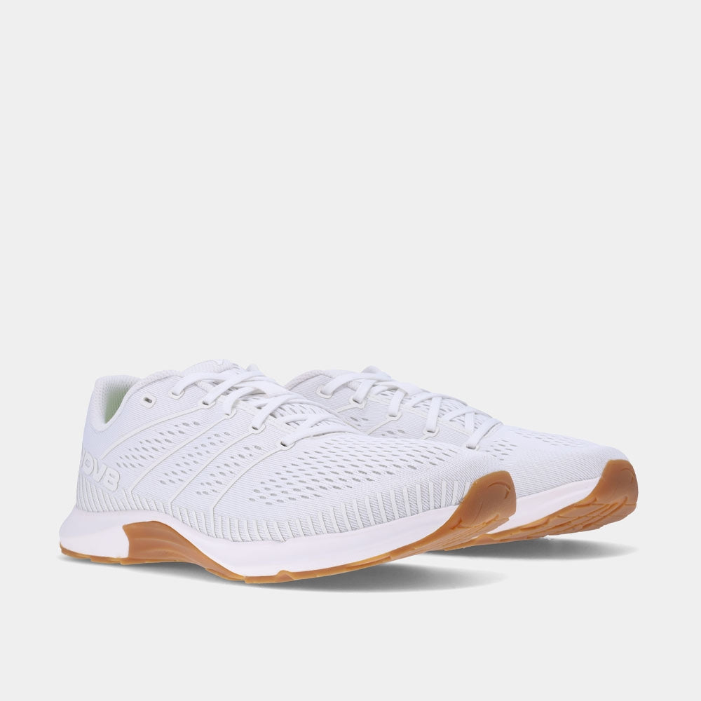 Pair of INOV8 F-Fly training shoes, white and gum, angled view