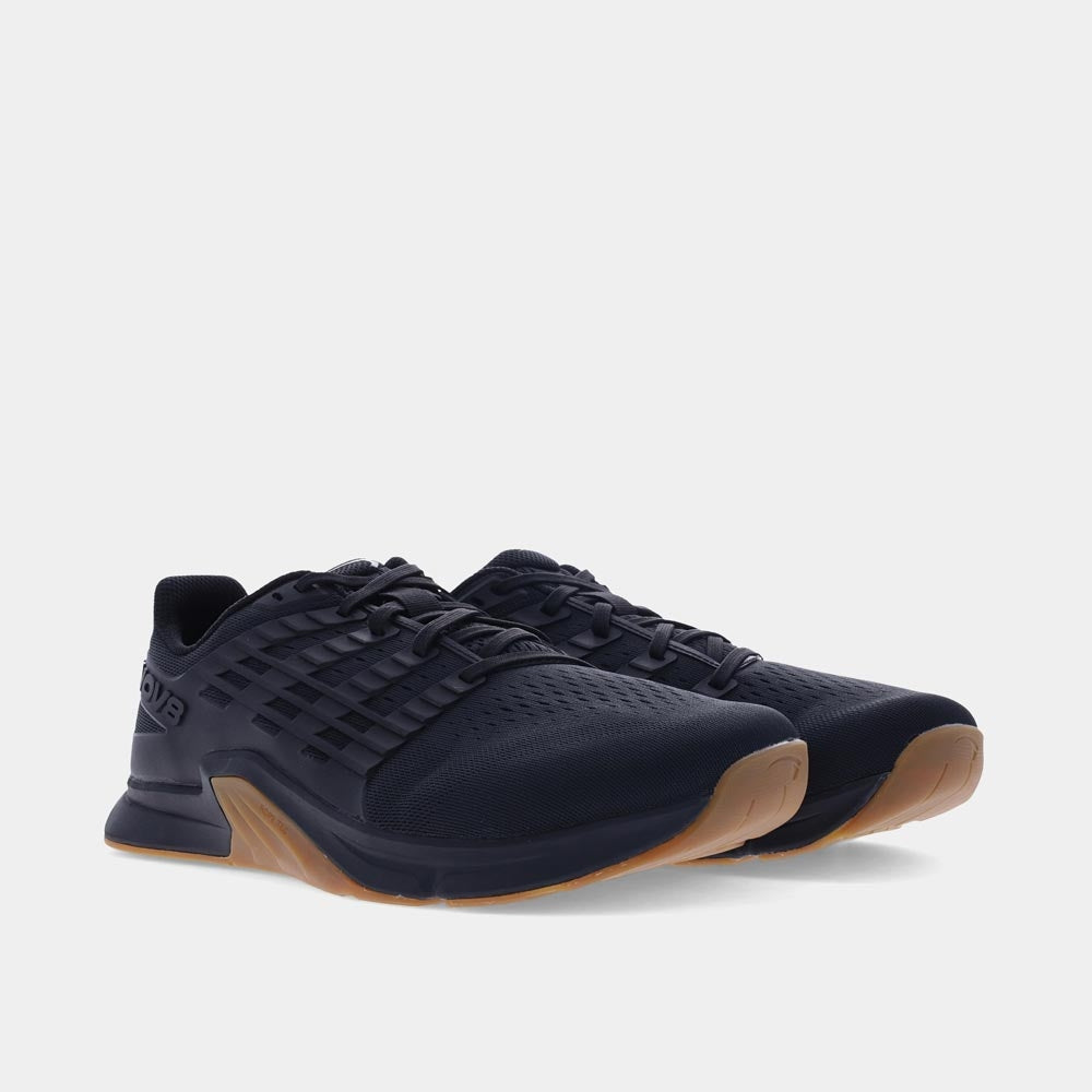 Pair of INOV8 F-Lite training shoes, black and gum, angled view