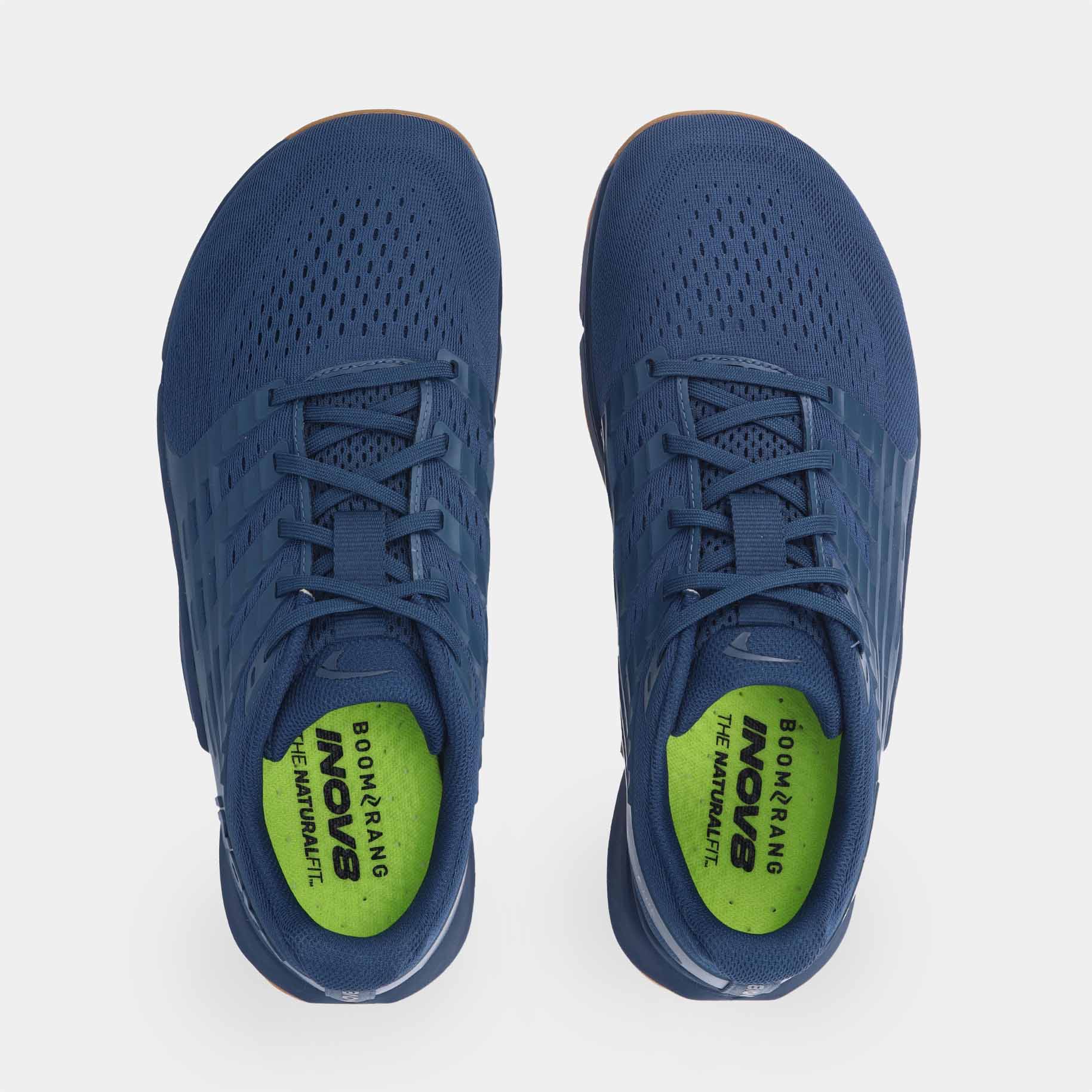Pair of INOV8 F-Lite training shoes, dark blue and gum, top view
