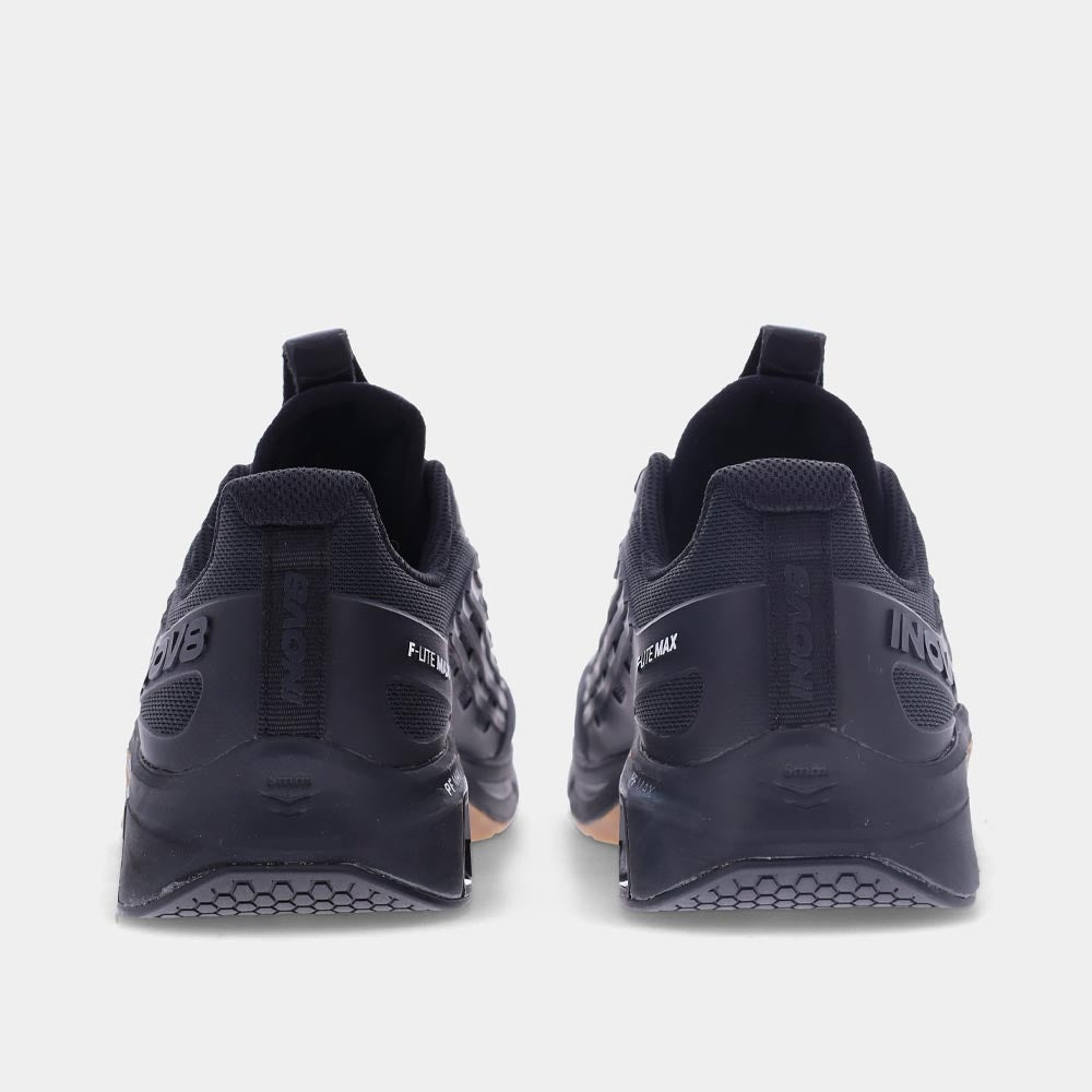 Pair of INOV8 F-Lite Max training shoes, black and gum, back view
