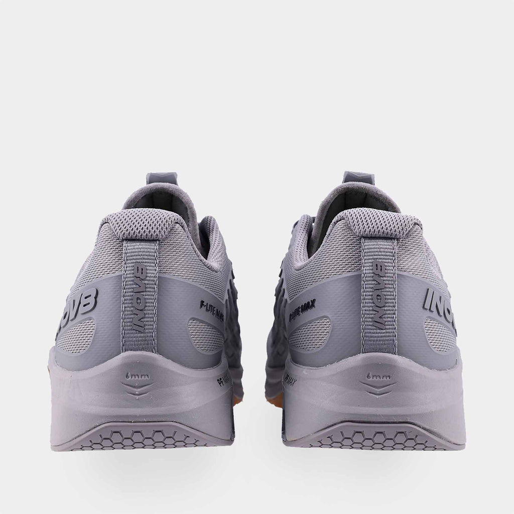 Pair of INOV8 F-Lite Max training shoes, grey and gum, back view