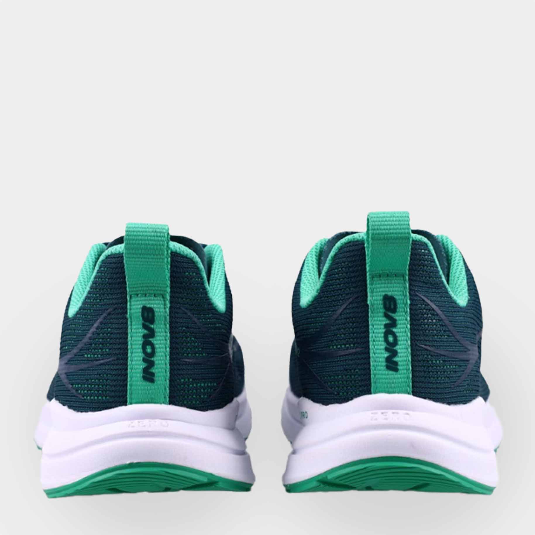 Pair of INOV8 RoadFly Zero road running shoes, dark teal and white, back view