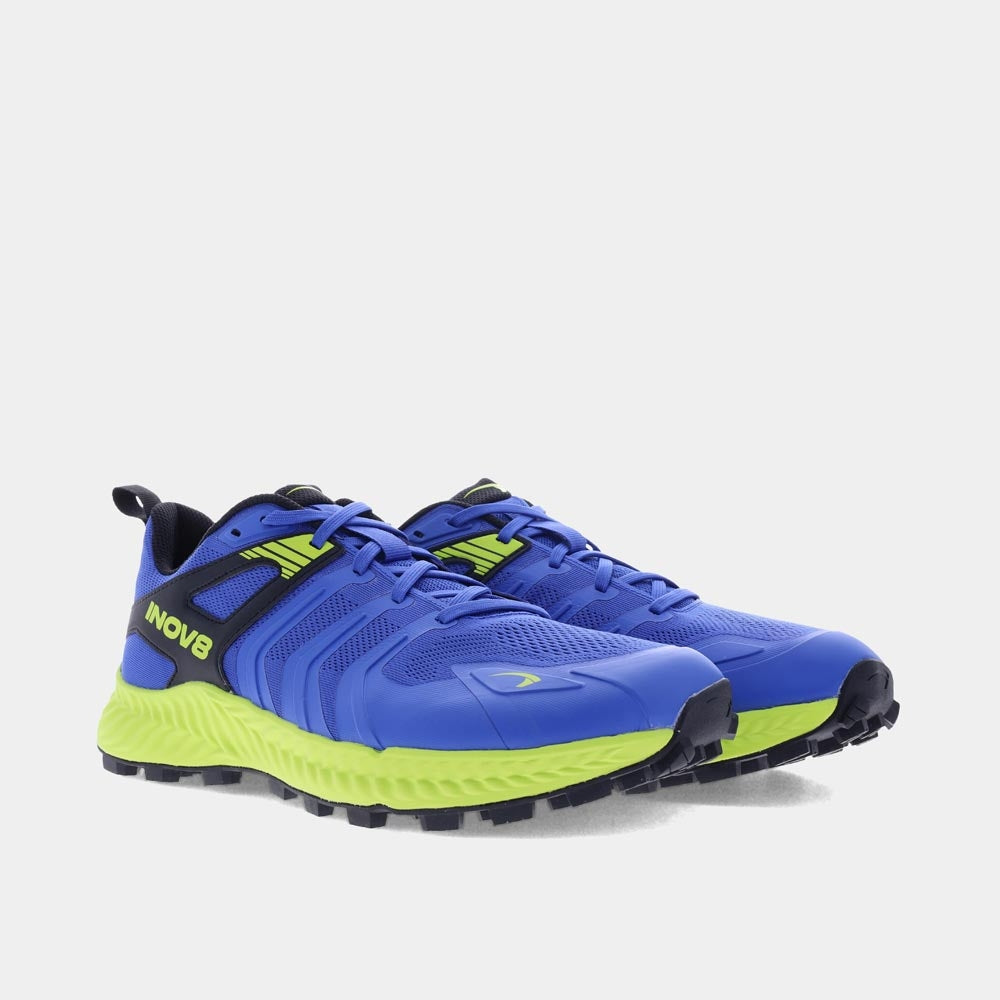 Pair of INOV8 TrailTalon trail running shoes, blue and lime, angled view