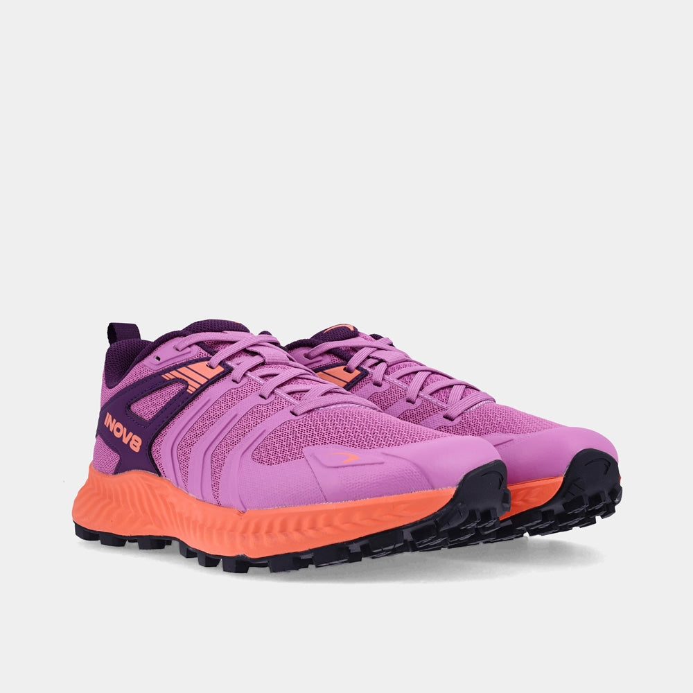 Pair of INOV8 TrailTalon trail running shoes, purple and coral, angled view