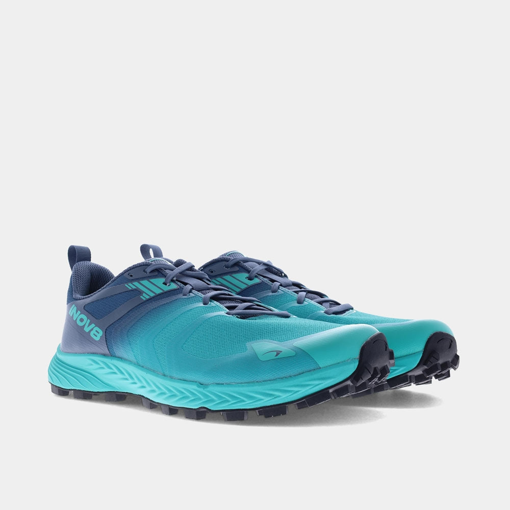Pair of INOV8 TrailTalon Speed trail running shoes, teal and blue, angled view